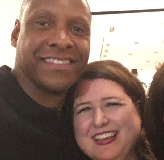 Heather and Masai pose for a selfie.